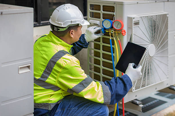 Professional Air Conditioning Repair technician working in Lindstrom, MN